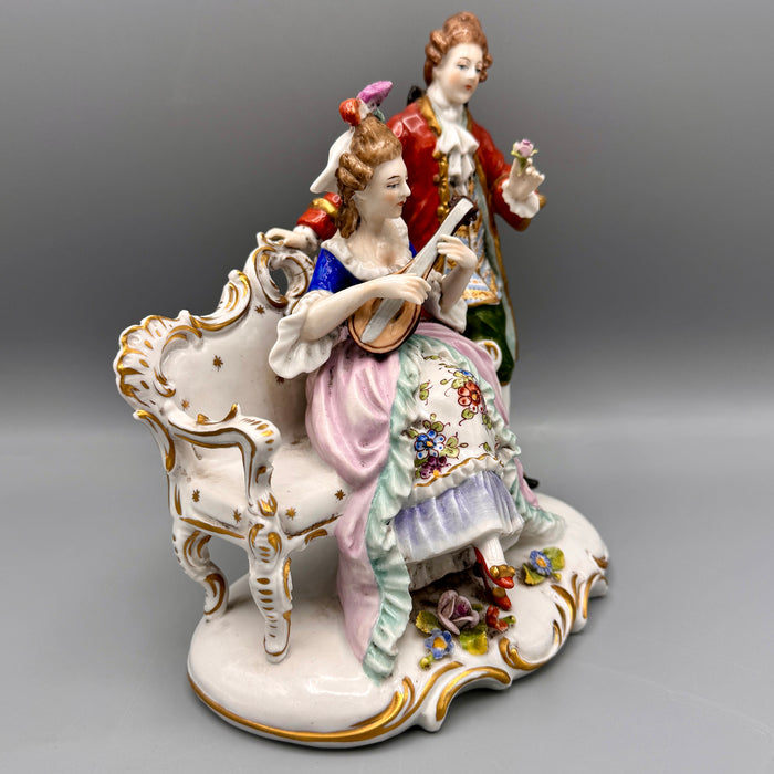 Capodimonte "Lezione di mandolino" porcellana policroma Napoli XIX sec